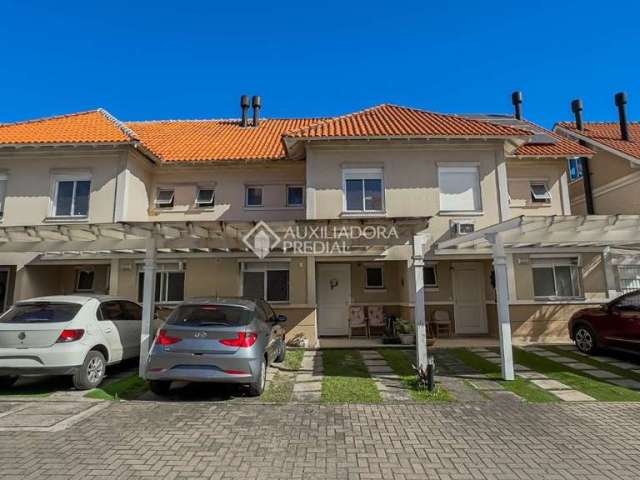 Casa em condomínio fechado com 3 quartos à venda na Avenida Willy Eugênio Fleck, 1500, Sarandi, Porto Alegre, 144 m2 por R$ 890.000