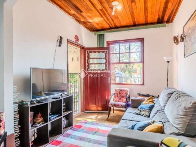 Casa em condomínio fechado com 2 quartos à venda na Rua Cangussu, 614, Nonoai, Porto Alegre, 180 m2 por R$ 485.000