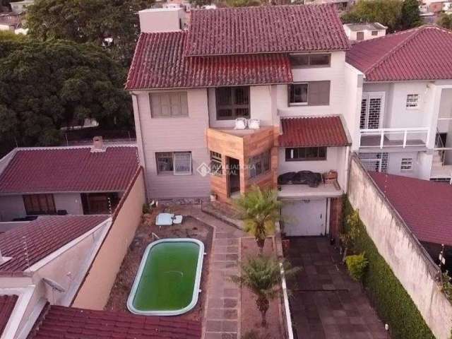 Casa com 3 quartos à venda na Rua Gregório da Fonseca, 167, Nonoai, Porto Alegre, 200 m2 por R$ 667.800