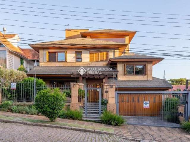 Casa com 4 quartos à venda na Rua Genny Zachia Stephanou, 43, Ipanema, Porto Alegre, 498 m2 por R$ 2.290.000