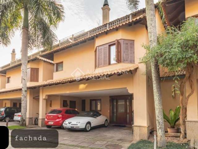 Casa em condomínio fechado com 3 quartos à venda na Avenida Otto Niemeyer, 77, Camaquã, Porto Alegre, 295 m2 por R$ 1.690.000