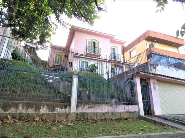 Casa em condomínio fechado com 4 quartos à venda na Avenida Silva Paes, 1715, Medianeira, Porto Alegre, 264 m2 por R$ 980.000