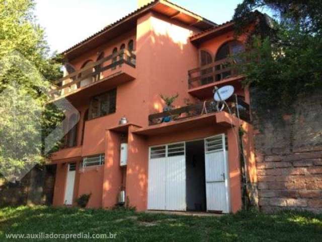 Casa em condomínio fechado com 4 quartos à venda na Rua Amapá, 836, Vila Nova, Porto Alegre, 279 m2 por R$ 1.200.000