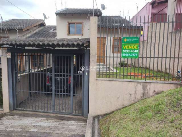 Casa com 3 quartos à venda na Avenida Tharcilo Nunes, 584, Santo André, São Leopoldo, 227 m2 por R$ 470.000