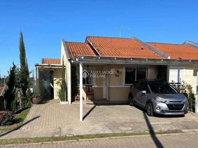 Casa em condomínio fechado com 3 quartos à venda na Rua Angola, 99, Feitoria, São Leopoldo, 109 m2 por R$ 342.000