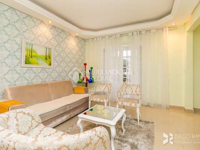 Casa com 2 quartos à venda na Rua Afonso Arinos, 869, Camaquã, Porto Alegre, 85 m2 por R$ 495.000