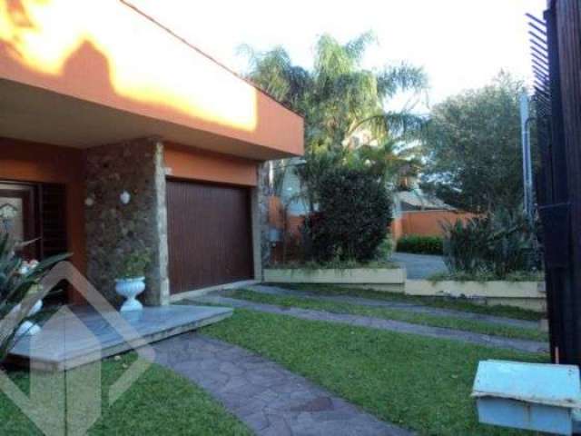 Casa com 5 quartos à venda na Rua Manoel Leão, 135, Pedra Redonda, Porto Alegre, 300 m2 por R$ 1.043.000