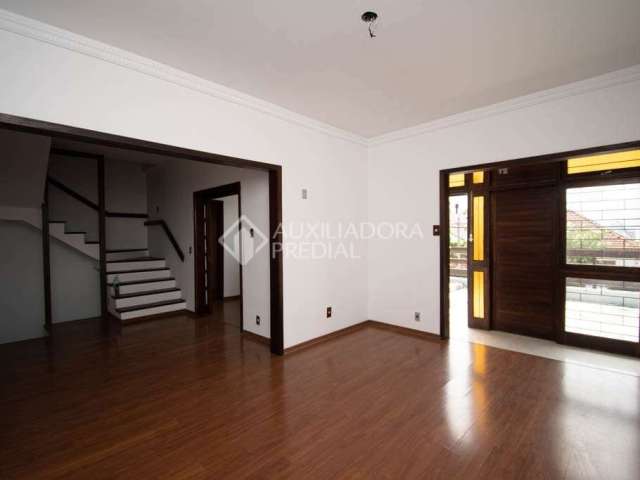 Casa com 4 quartos à venda na Rua Dom Pedrito, 317, Passo da Areia, Porto Alegre, 310 m2 por R$ 900.000