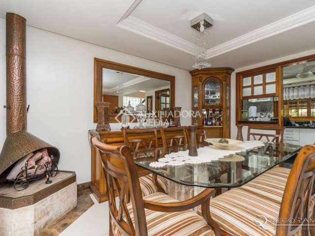 Casa em condomínio fechado com 3 quartos à venda na Avenida Coronel Marcos, 2171, Pedra Redonda, Porto Alegre, 171 m2 por R$ 798.000