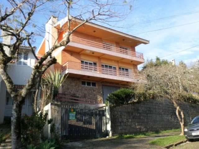 Casa com 4 quartos à venda na Rua Caeté, 1047, Vila Assunção, Porto Alegre, 323 m2 por R$ 1.800.000