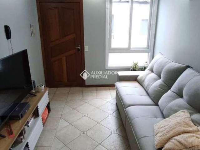 Apartamento com 2 quartos à venda na Rua Padre João Batista Reus, 3347, Camaquã, Porto Alegre, 55 m2 por R$ 210.000