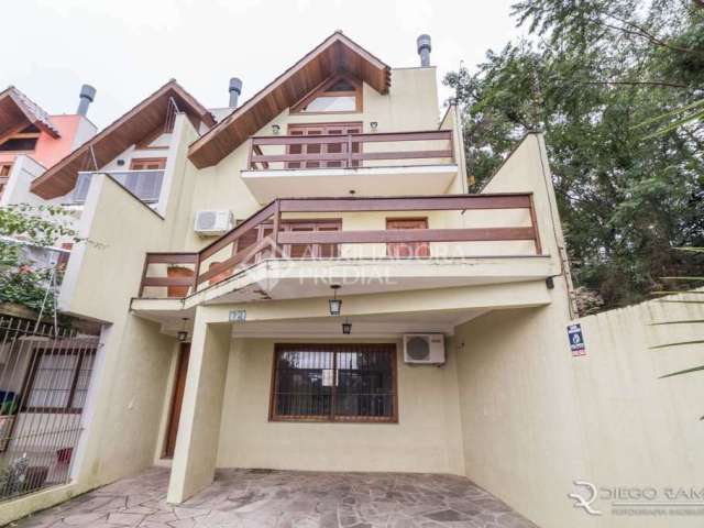 Casa com 3 quartos à venda na Rua Jayme Saul de Borba, 72, Espírito Santo, Porto Alegre, 191 m2 por R$ 598.000