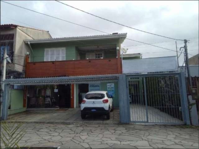 Casa com 4 quartos à venda na Travessa Escobar, 409, Camaquã, Porto Alegre, 409 m2 por R$ 1.950.000