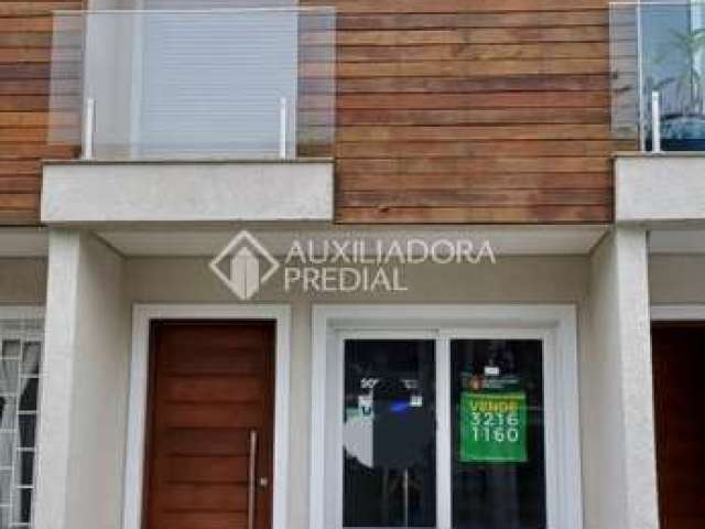 Casa com 2 quartos à venda na Rua Inhanduí, 508, Cristal, Porto Alegre, 83 m2 por R$ 549.999