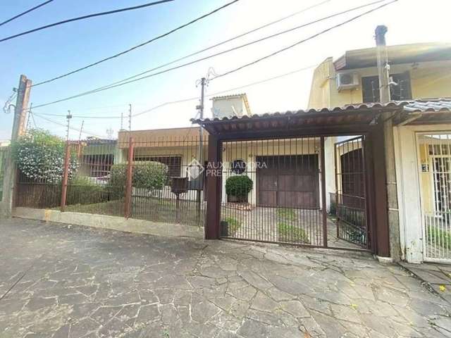 Casa com 3 quartos à venda na Rua Márcio Dias, 530, Nonoai, Porto Alegre, 120 m2 por R$ 550.000