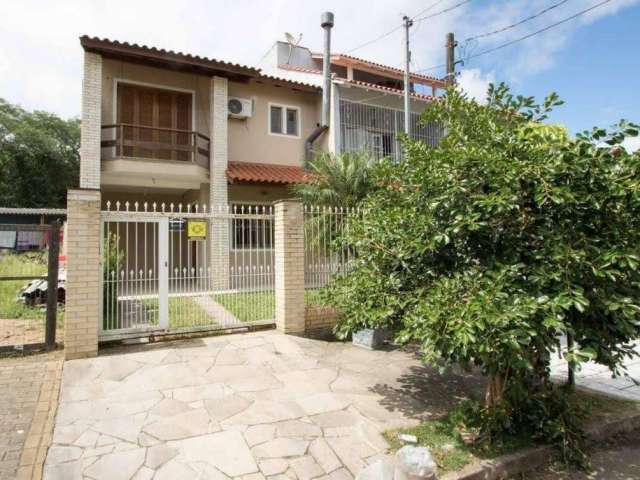 Casa com 3 quartos à venda na Rua Doutor Lauro Miguel Sturm, 217, Hípica, Porto Alegre, 118 m2 por R$ 490.000