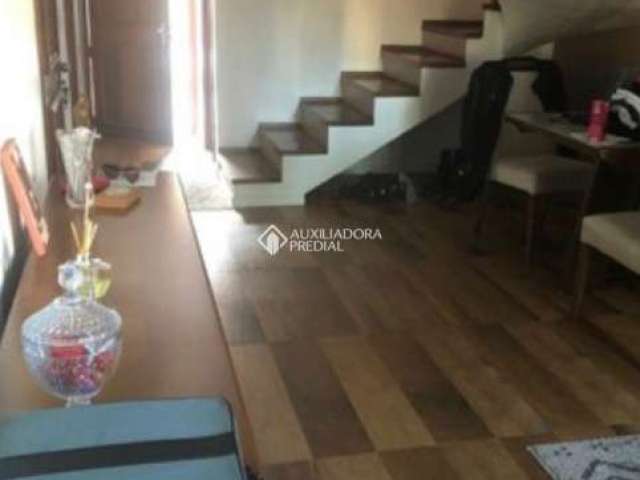 Casa em condomínio fechado com 3 quartos à venda na Avenida Orleaes, 105, Guarujá, Porto Alegre, 196 m2 por R$ 470.000