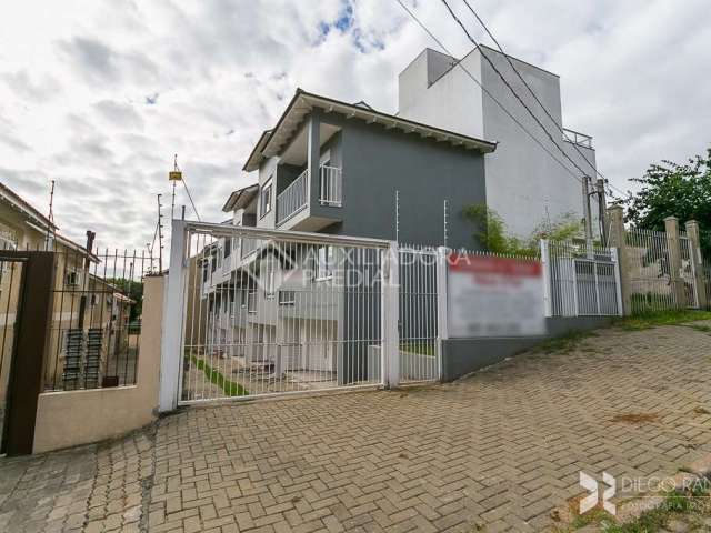 Casa em condomínio fechado com 3 quartos à venda na Rua Padre João Batista Reus, 2754, Camaquã, Porto Alegre, 115 m2 por R$ 460.000