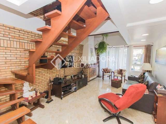 Casa em condomínio fechado com 3 quartos à venda na Avenida Copacabana, 358, Tristeza, Porto Alegre, 177 m2 por R$ 1.195.000