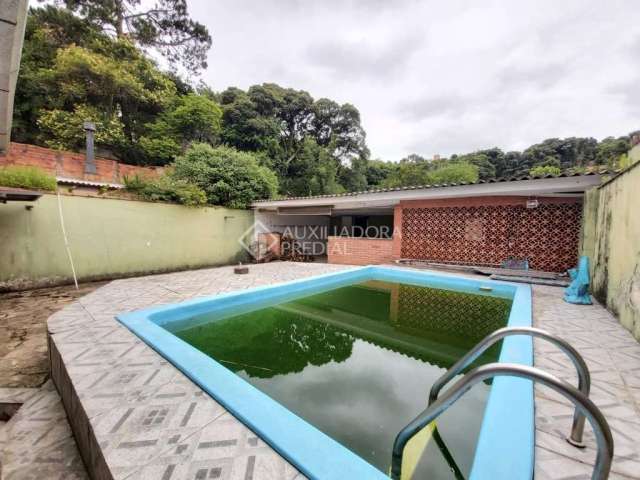 Casa em condomínio fechado com 3 quartos à venda na Rua Padre João Batista Reus, 1315, Vila Conceição, Porto Alegre, 200 m2 por R$ 650.000