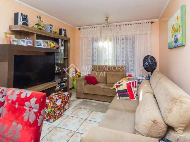 Casa em condomínio fechado com 3 quartos à venda na Rua Panambi, 185, Cavalhada, Porto Alegre, 149 m2 por R$ 550.000