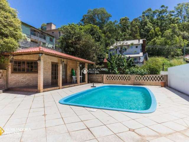 Casa com 3 quartos à venda na Rua dos Gerânios Floridos, 53, Carvoeira, Florianópolis, 260 m2 por R$ 1.900.000