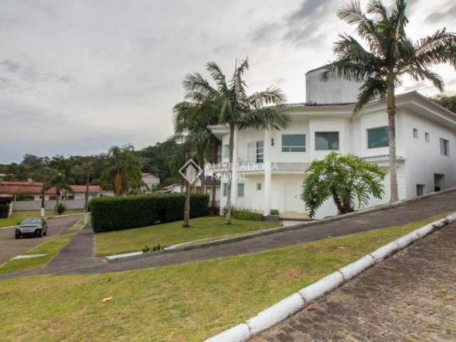 Casa em condomínio fechado com 4 quartos à venda na Rodovia Haroldo Soares Glavan, 929, Cacupé, Florianópolis, 484 m2 por R$ 3.200.000