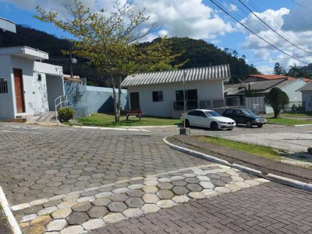 Casa em condomínio fechado com 2 quartos à venda na Rua Fermino Vieira Cordeiro, 1600, Espinheiros, Itajaí, 82 m2 por R$ 583.000