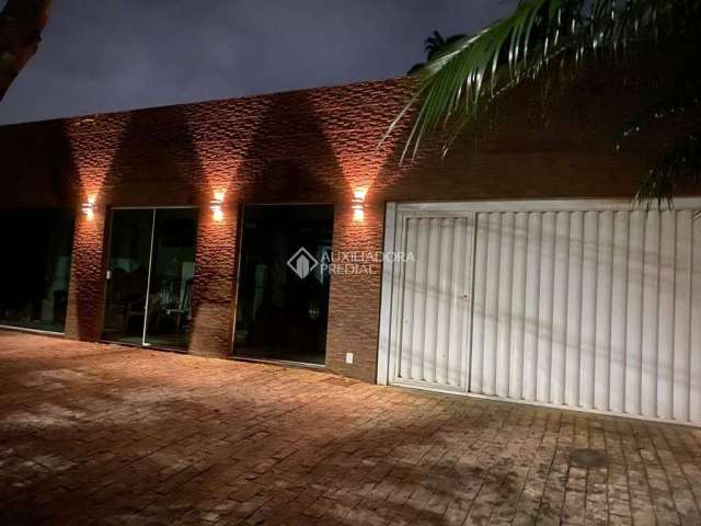 Casa com 4 quartos à venda na Videira, 40, Fazenda, Itajaí, 235 m2 por R$ 1.150.000