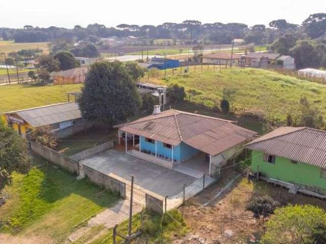 Lote para venda com 650 metros, com casa em madeira