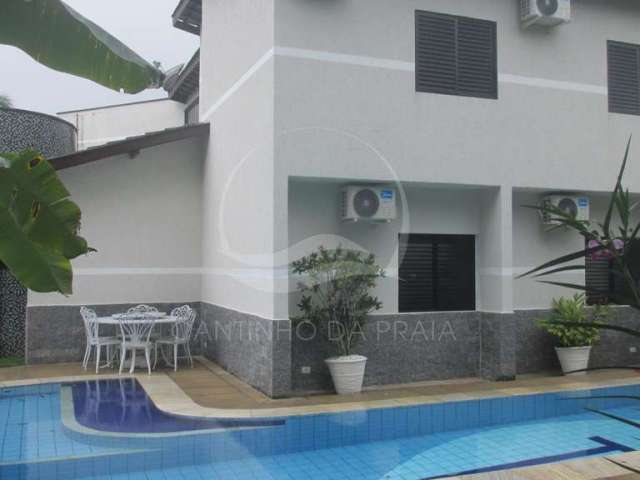 Casa na praia com 5 dormitórios, com ar, piscina, churrasq