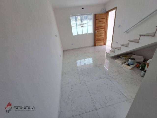 Sobrado com 3 dormitórios à venda, 104 m² por R$ 595.000,00 - Tude Bastos (Sítio do Campo) - Praia Grande/SP