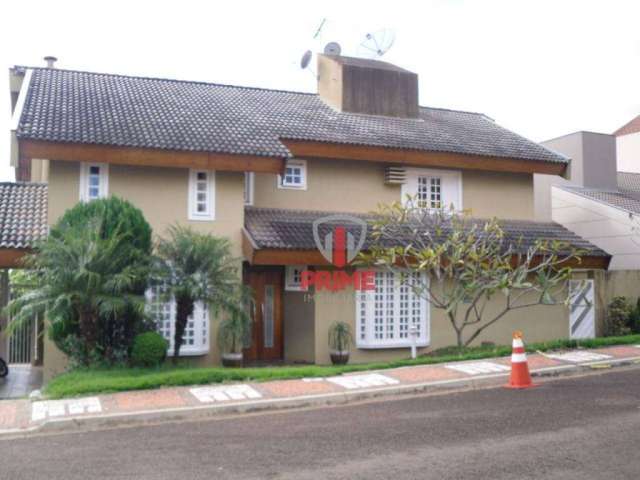 Casa à venda no condomínio Vale das Araucárias em Londrina. Sobrado com 4 quartos sendo 2 suítes, sala, lavabo, copa, cozinha, área de serviço, 3 banh