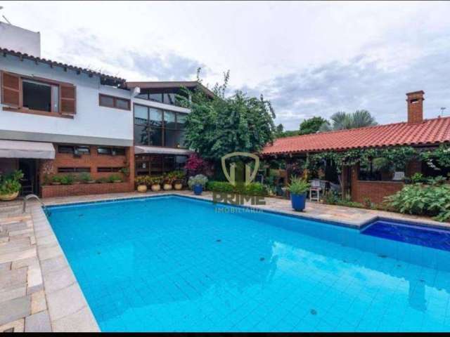 Casa à venda, em frente ao Lago Igapó, em Londrina. Residencial ou comercial. Área de lazer com espaço gourmet, piscina e área verde.