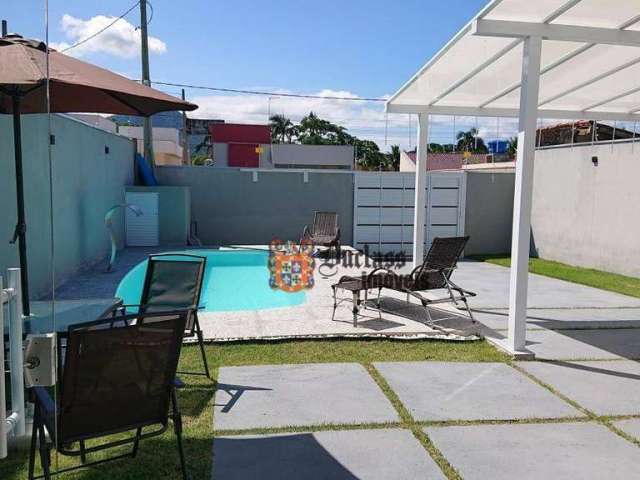 Casa com 3 dormitórios à venda, 107 m² por R$ 890.000,00 - Massaguaçu - Caraguatatuba/SP