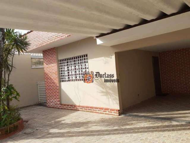 Casa com 3 dormitórios à venda, 135 m² por R$ 600.000 - Maracanã - Praia Grande/SP