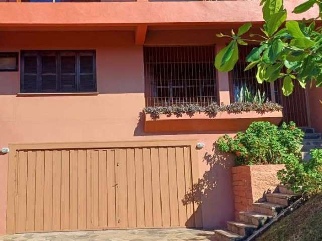 Casa em condomínio fechado com 3 quartos à venda na Rua Umbu, 46, Ideal, Novo Hamburgo por R$ 495.000