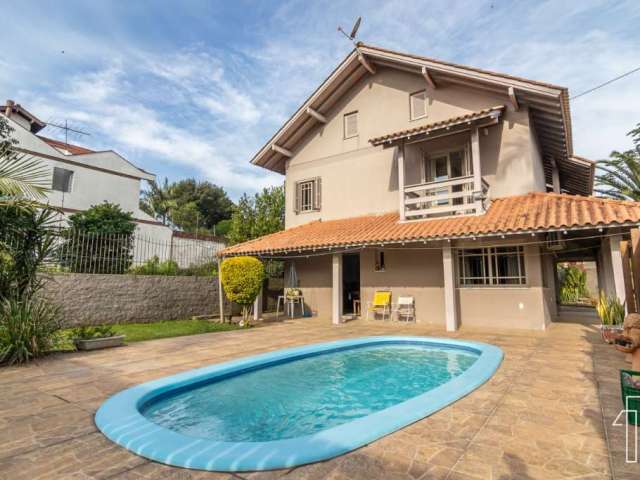 Casa com 3 quartos à venda na Rua Índia, 21, Petrópolis, Novo Hamburgo por R$ 790.000