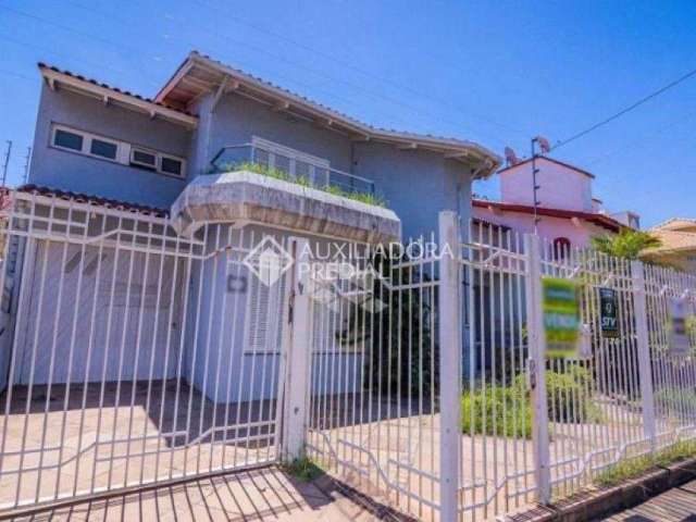 Casa com 3 quartos à venda na Avenida Doutor Sezefredo Azambuja Vieira, 156, Marechal Rondon, Canoas, 438 m2 por R$ 1.840.000