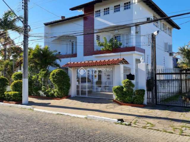 Casa com 5 quartos à venda na Rua das Araucárias, 1175, Harmonia, Canoas, 410 m2 por R$ 800.000