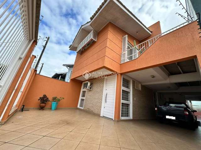 Casa com 4 quartos à venda na Rua Martinho Lutero, 125, Harmonia, Canoas, 178 m2 por R$ 850.000