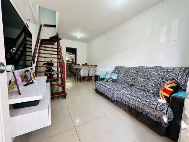 Casa em condomínio fechado com 2 quartos à venda na Avenida Guilherme Schell, 1250, Rio Branco, Canoas, 76 m2 por R$ 250.000