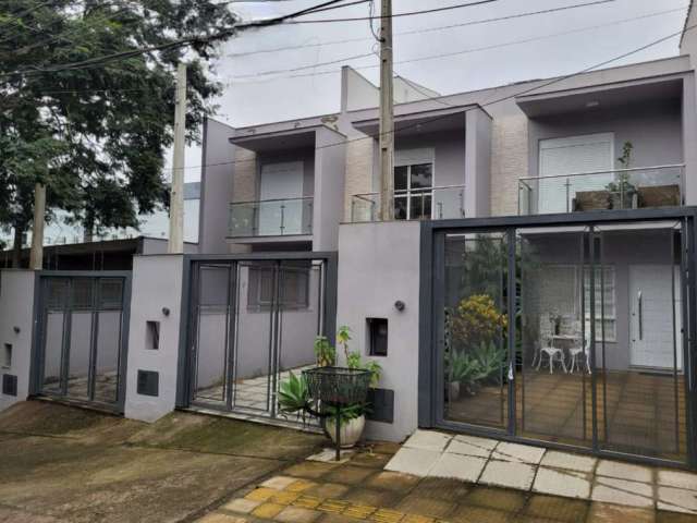 Casa com 3 quartos à venda na Rua Conde de Porto Alegre, 389, Nossa Senhora das Graças, Canoas, 114 m2 por R$ 532.000