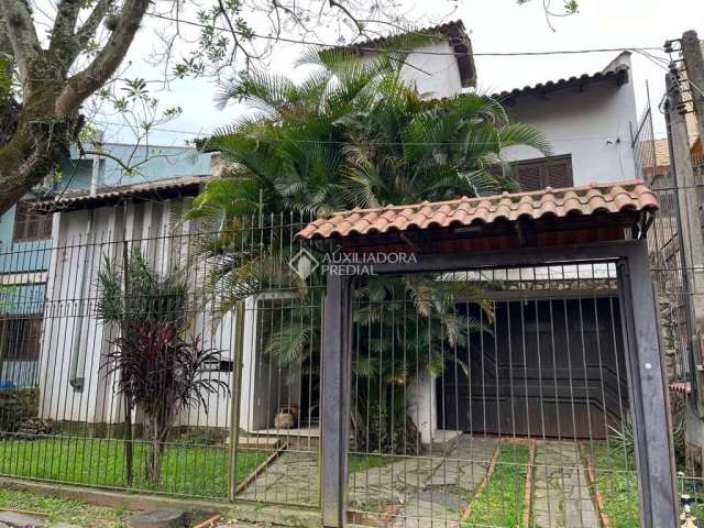 Casa com 4 quartos à venda na Rua São Caetano, 101, Marechal Rondon, Canoas, 360 m2 por R$ 1.000.000