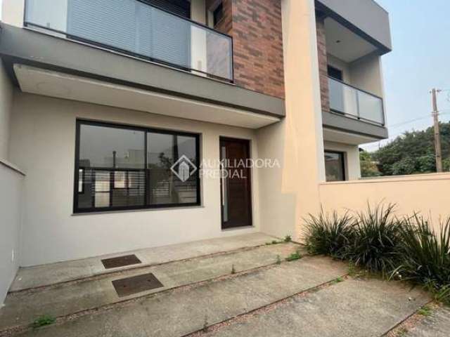 Casa com 3 quartos à venda na Rua da Erva Mate, 1172, Igara, Canoas, 110 m2 por R$ 569.000