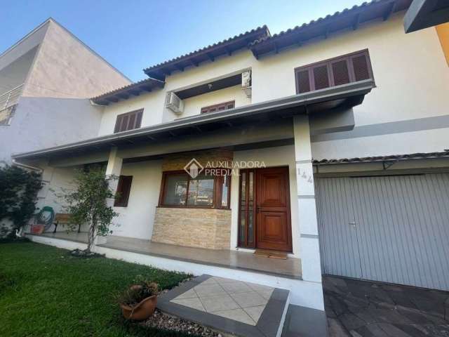 Casa com 5 quartos à venda na Rua das Petúnias, 144, Estância Velha, Canoas, 214 m2 por R$ 1.098.000