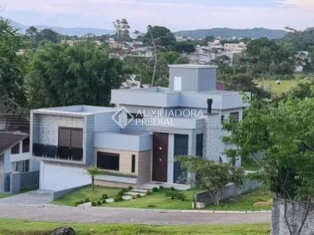 Casa em condomínio fechado com 4 quartos à venda na Rua Leonel Pereira, 2033, Cachoeira do Bom Jesus, Florianópolis, 235 m2 por R$ 2.350.000