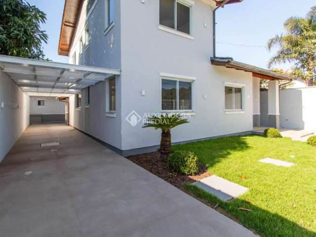 Casa com 5 quartos à venda na Rua Coruja Dourada, 338, Campeche, Florianópolis, 180 m2 por R$ 1.810.000