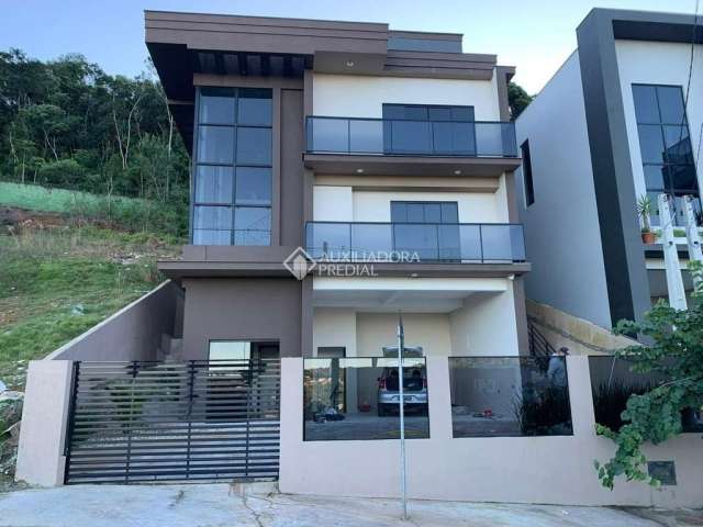 Casa em condomínio fechado com 5 quartos à venda na Rodovia SC-281, 12, Sertão do Maruim, São José, 330 m2 por R$ 2.300.000