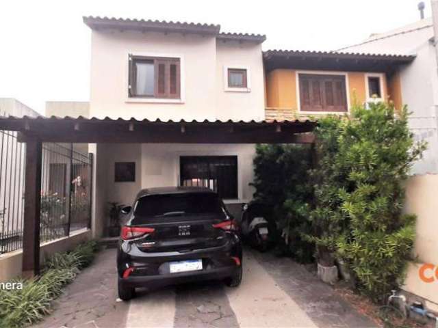 Casa com 3 dormitórios para alugar, 110 m² por R$ 2.865,00/mês - Hípica - Porto Alegre/RS